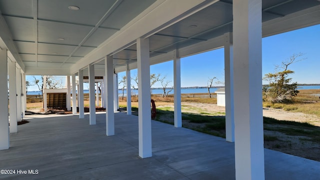 view of patio / terrace featuring a water view