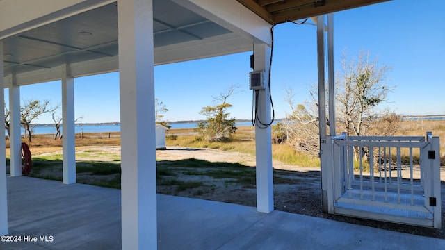 view of patio / terrace with a water view