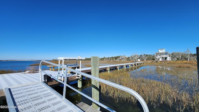 view of dock with a water view