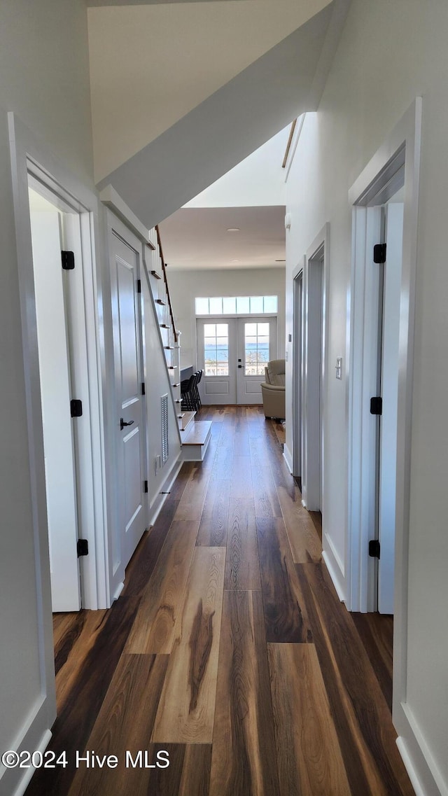 hall featuring dark wood-type flooring