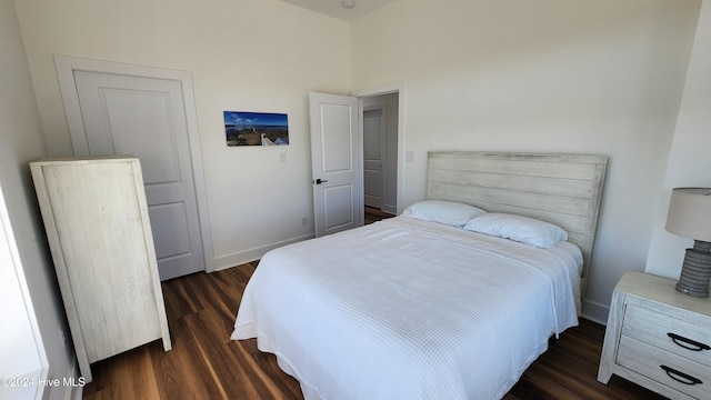 bedroom featuring dark hardwood / wood-style floors