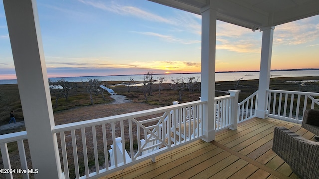 deck at dusk with a water view