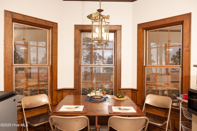 dining room featuring an inviting chandelier