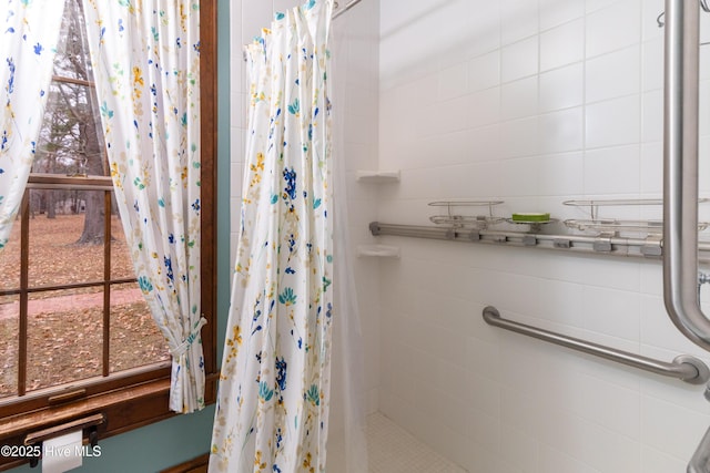 bathroom with a shower with shower curtain