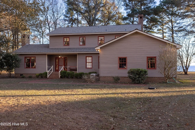 view of front of house with a front yard