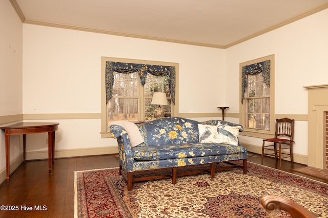 living room with dark wood-type flooring and ornamental molding