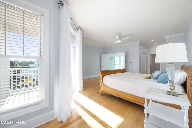 bedroom with crown molding, a closet, ceiling fan, and light hardwood / wood-style flooring