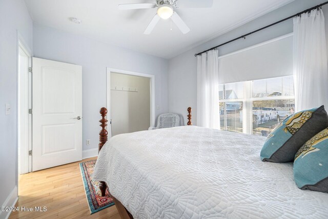 bedroom with hardwood / wood-style floors