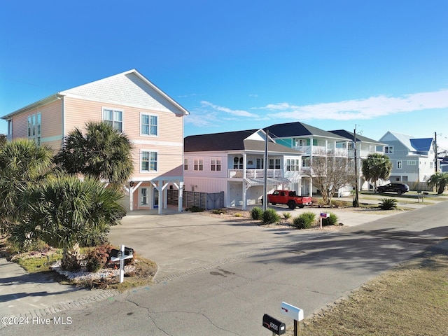 view of front of home featuring a carport