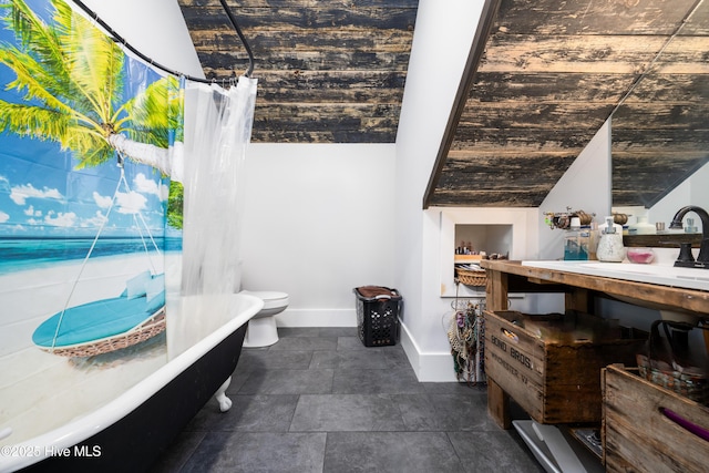 bathroom with toilet, shower / bath combo with shower curtain, and vaulted ceiling