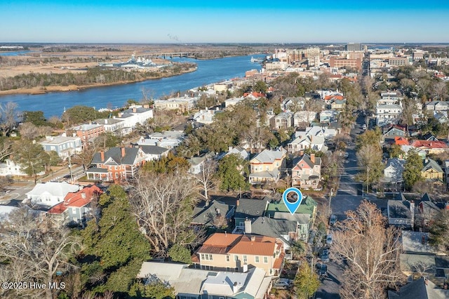 birds eye view of property featuring a water view