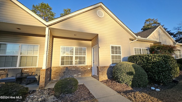 doorway to property featuring a porch