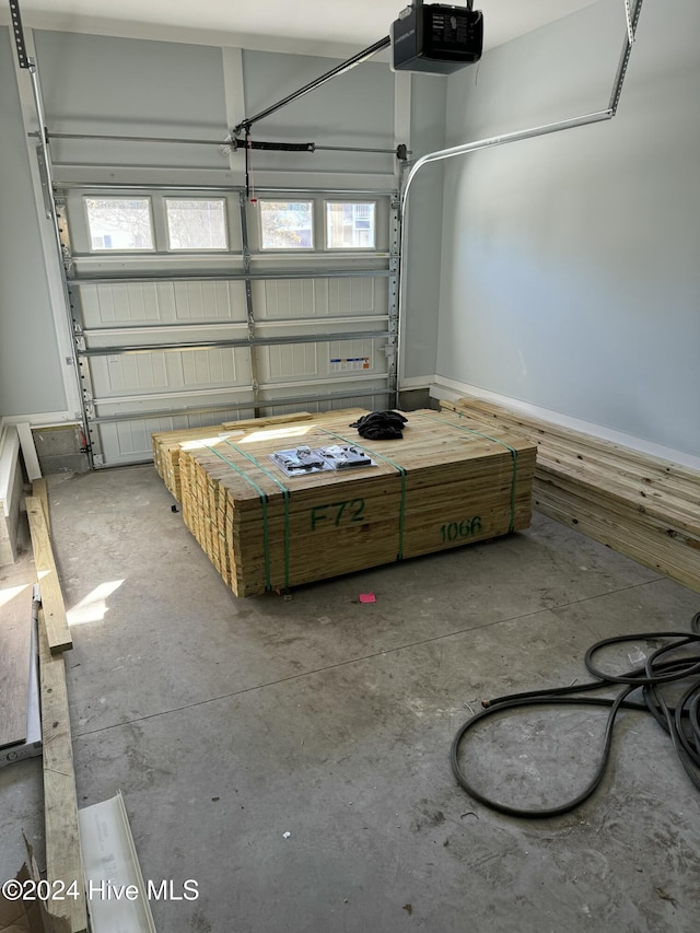 garage featuring a garage door opener