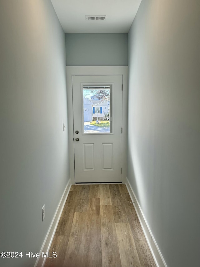 entryway with light hardwood / wood-style flooring