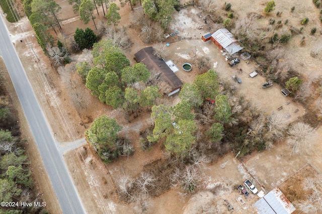 birds eye view of property featuring a rural view