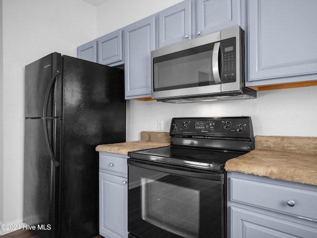 kitchen with black appliances