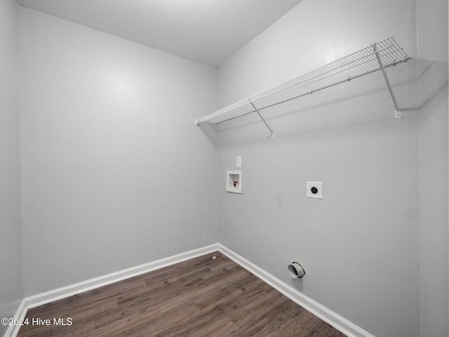 laundry area with hookup for a washing machine, dark hardwood / wood-style flooring, and electric dryer hookup