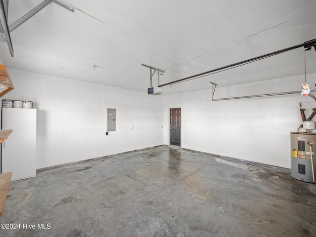 garage featuring electric panel, electric water heater, and a garage door opener