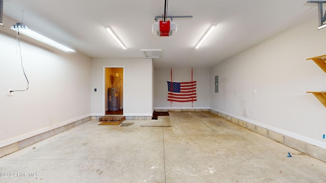 garage with electric panel, a garage door opener, and water heater