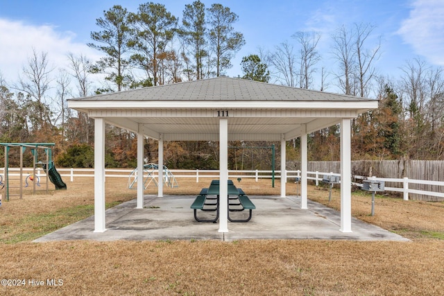 view of property's community featuring a gazebo and a playground