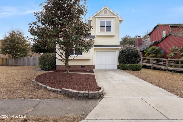 view of front of home with a garage