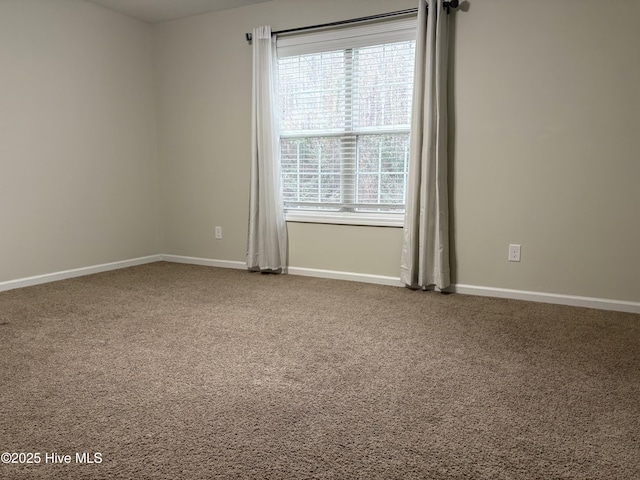 empty room with carpet flooring