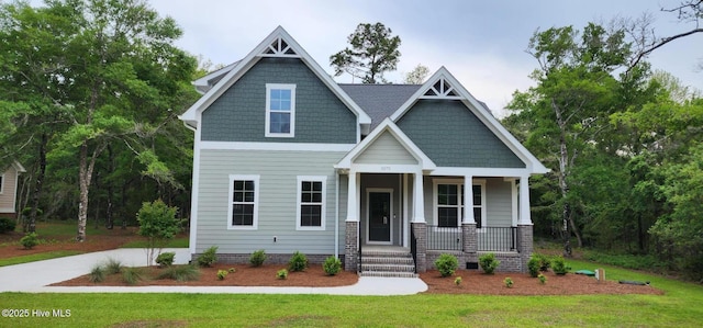 3375 Sandridge Ln SW, Supply, NC 28462 - craftsman inspired home featuring a front lawn and covered porch