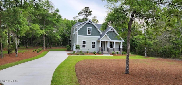 3375 Sandridge Ln SW, Supply, NC 28462 - craftsman-style house featuring driveway, a front yard, and covered porch