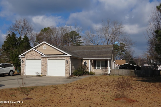 ranch-style house featuring a garage