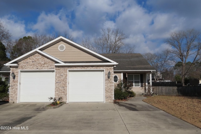 view of front of property with a garage