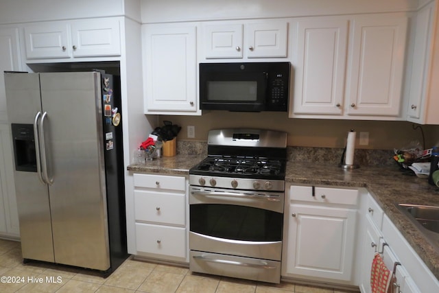 kitchen with white cabinetry and stainless steel appliances