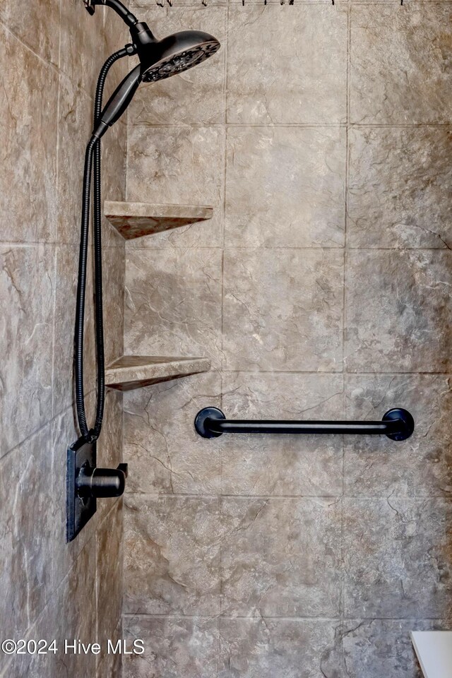 bathroom featuring tile patterned flooring, vanity, and toilet