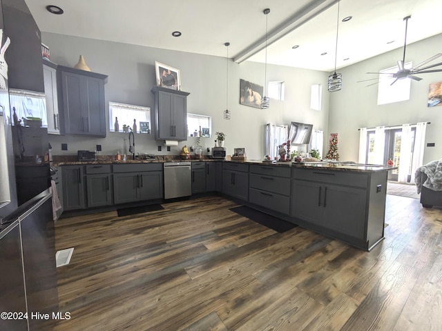 kitchen with gray cabinetry, dark wood-type flooring, sink, stainless steel dishwasher, and kitchen peninsula