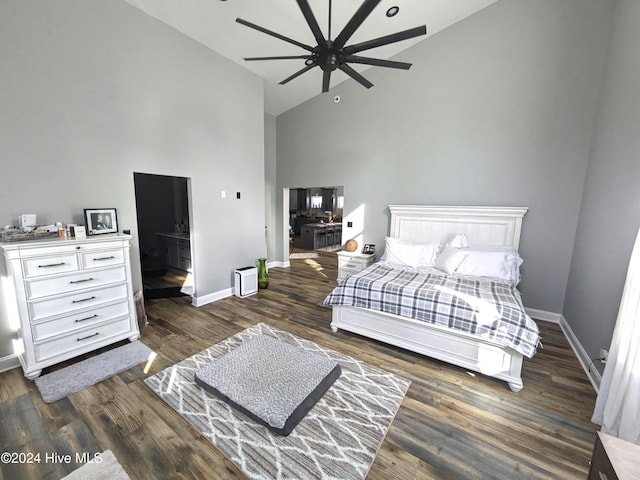 bedroom featuring high vaulted ceiling, ceiling fan, and dark wood-type flooring