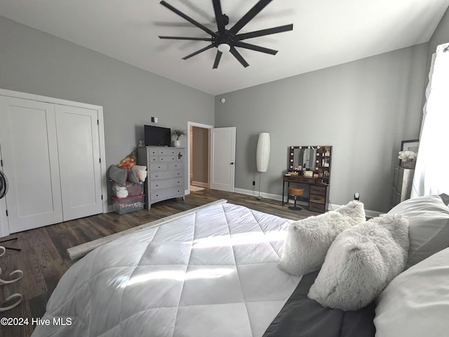 bedroom with ceiling fan and dark wood-type flooring