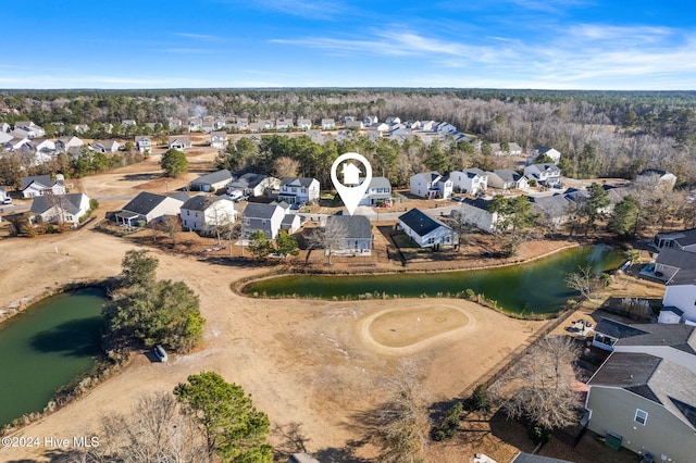 aerial view featuring a residential view and a water view