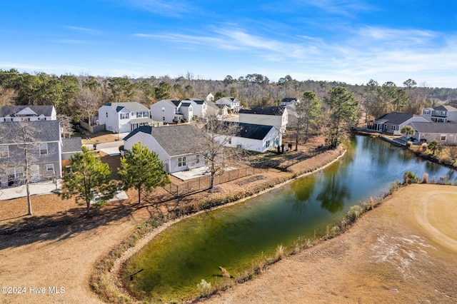 aerial view featuring a residential view and a water view