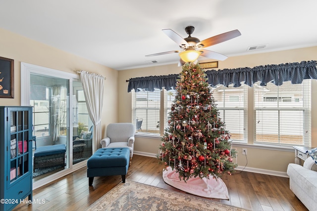 sitting room featuring ceiling fan, hardwood / wood-style floors, and plenty of natural light