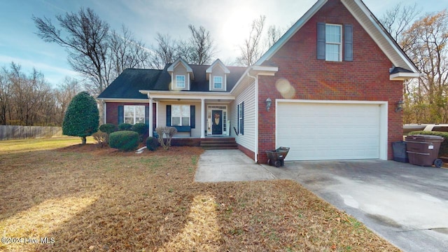 view of front facade featuring a garage, a porch, and a front yard