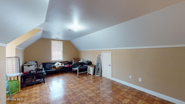 bonus room with parquet floors and vaulted ceiling