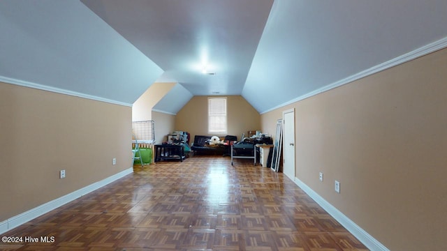 additional living space with dark parquet floors and vaulted ceiling