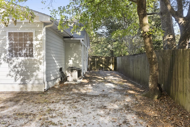 view of side of property with cooling unit