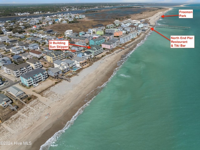 aerial view with a view of the beach and a water view