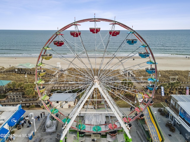 bird's eye view featuring a view of the beach and a water view