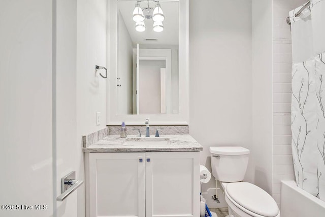 full bathroom featuring vanity, shower / bath combo, and toilet