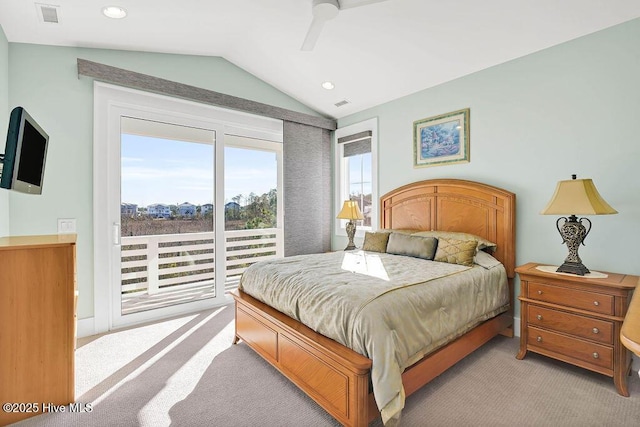 carpeted bedroom featuring vaulted ceiling and ceiling fan