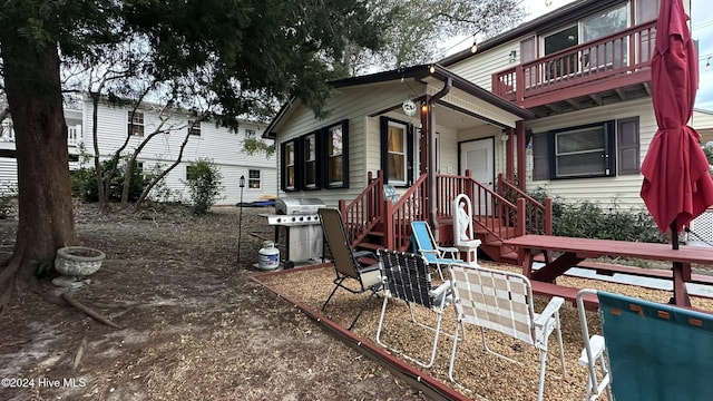 exterior space featuring a balcony