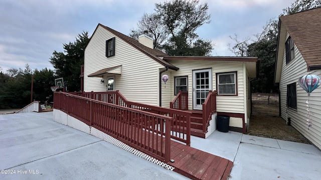 view of front of house with a wooden deck