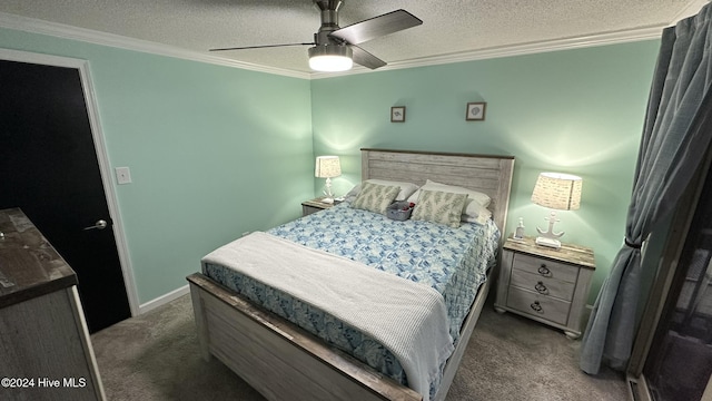 bedroom featuring a textured ceiling, dark carpet, ceiling fan, and crown molding