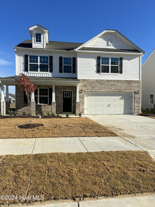 view of front of home with a garage